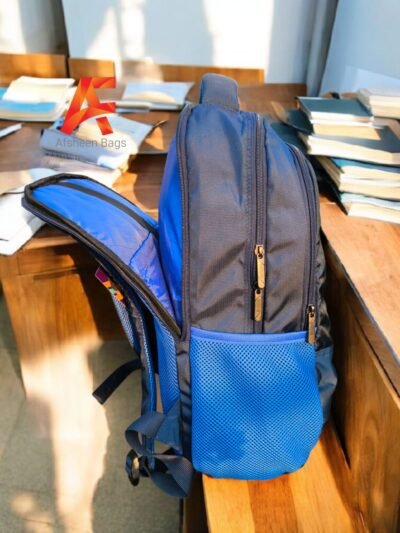 American Tourister vertical stripe pattern Backpack, the perfect fusion of bold design and uncompromising functionality built for the modern student and commuter