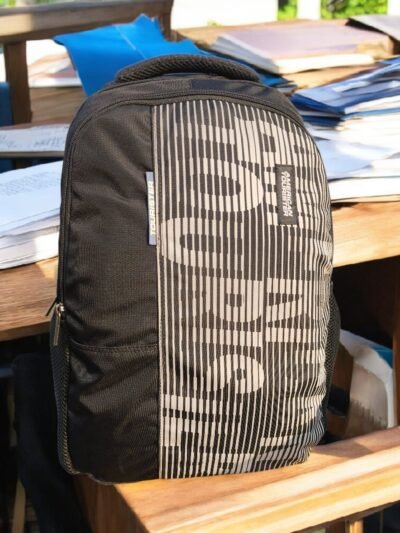 American Tourister vertical stripe pattern Backpack, the perfect fusion of bold design and uncompromising functionality built for the modern student and commuter